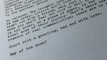 Load image into Gallery viewer, A close-up angled view of printed text on a white sheet of paper, with the phrase Start with a greeting, and end with love?' visible on the left side.