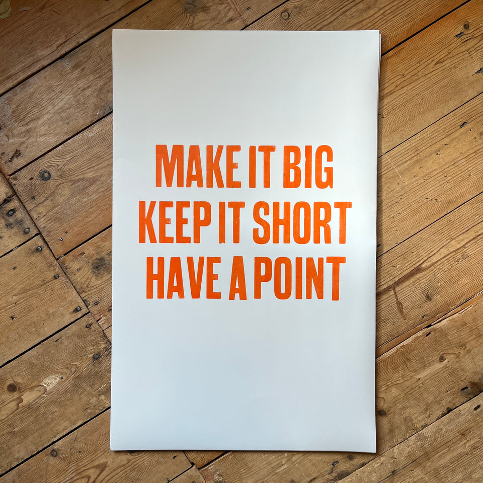 Poster with orange type saying Make It Big, Keep It Short, Have A Point